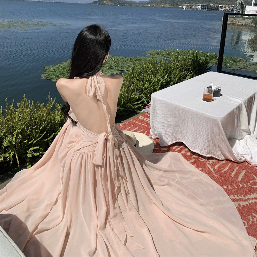 Seaside vacation beauty God descending sleeveless V-neck neckline dress new gentle temperament wooden ear edge backless long skirt