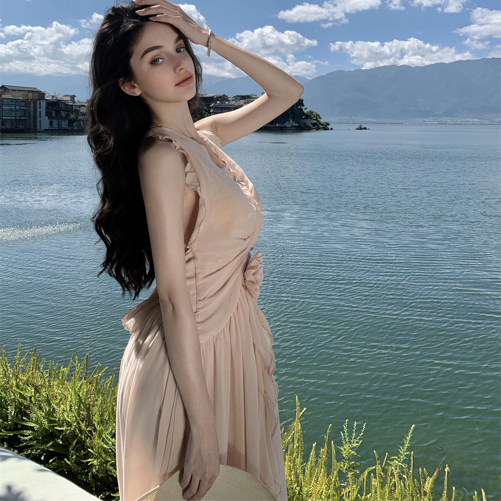 Seaside vacation beauty God descending sleeveless V-neck neckline dress new gentle temperament wooden ear edge backless long skirt